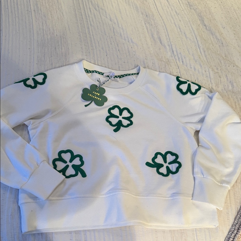 Jane and Delancey White Top with Green Clover Design